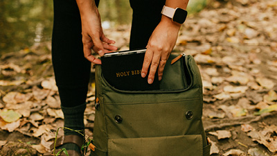 Putting a Bible in a backpack